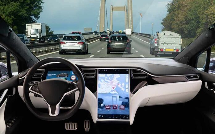 1174395055 featured image Car interior with self-driving mode on highway.