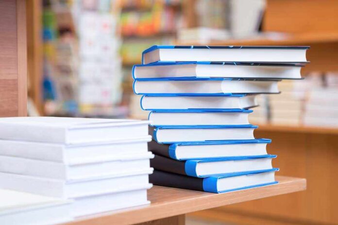 182569214 featured image Stack of books on a wooden table indoors