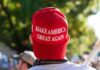 Person wearing a red Make America Great Again hat.