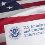US flag and Immigration Customs Enforcement document