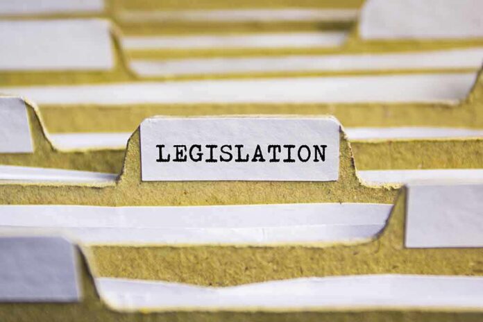 506543236 featured image folder with label of legislation