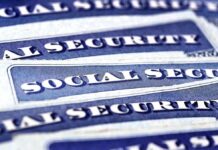 Blue Social Security cards piled together