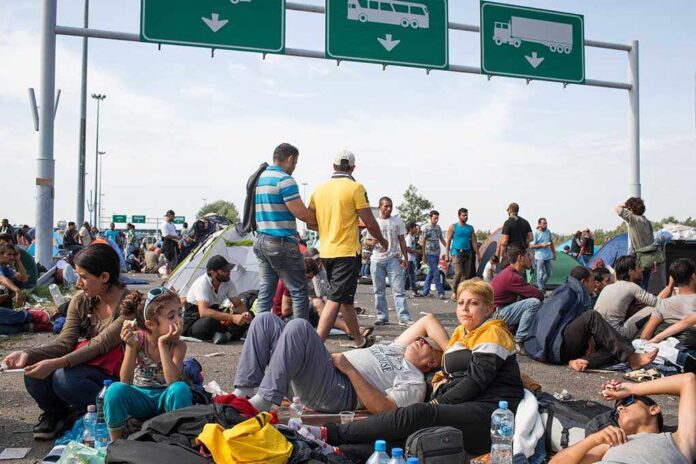 325232072 featured image People sitting and resting on a highway.