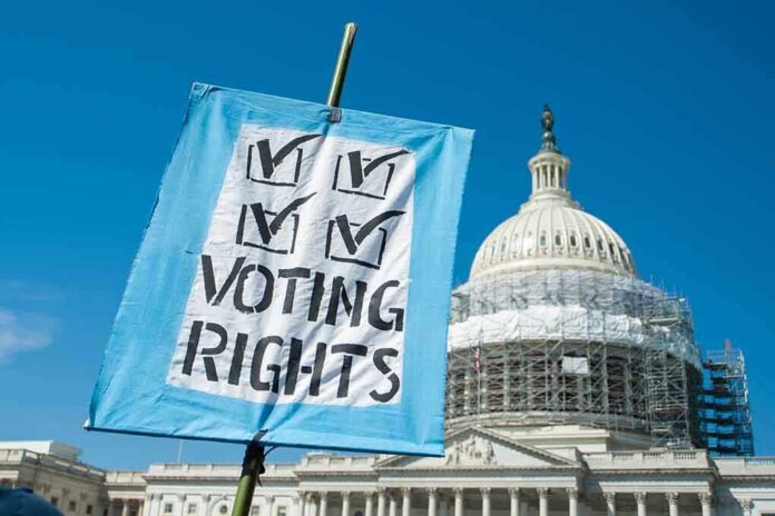 407601550 featured image Sign reading Voting Rights in front of Capitol building