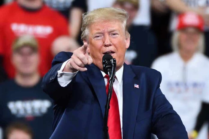 1585237510 featured image Man in suit pointing speaking at a rally