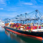Tariff Showdown: Trump’s 36% Threat Rattles Thailand Container ship docked at a busy industrial port