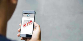 Person reading a scam message on a smartphone