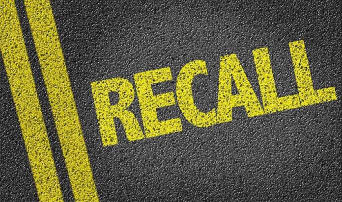 486784426 featured image Yellow RECALL text on asphalt background.