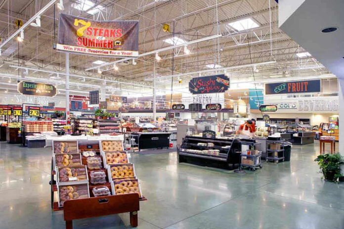 503073682 Supermarket interior with various food sections and displays