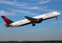 Delta airplane taking off from runway