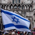 Israeli flag at a crowded outdoor event