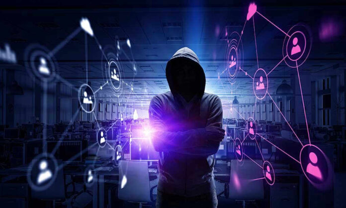 Hacker in hooded sweatshirt with digital connections overlay