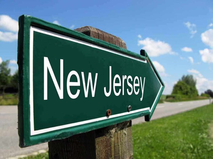 Directional road sign indicating New Jersey
