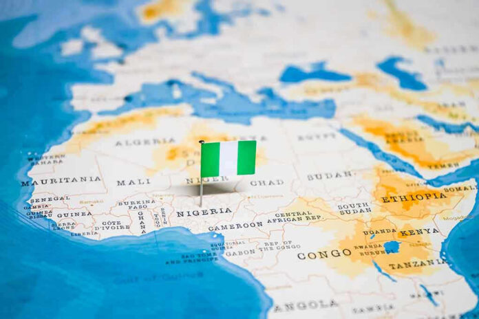 1326882539 Flag pin marking Nigeria on Africa map