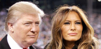 Two people posing closely at an event.