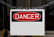 OSHA’s Heat Rules: Game Changer by 2026 A warning sign displaying the word DANGER in bold red letters
