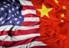 ARCADA Mayor Caught as China’s Secret Agent United States flag merged with China flag.