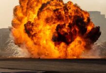 Explosive Test FAIL – Blue Origin’s Critical Moment A large explosion creating a massive fireball and smoke