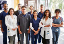 18 Heroes Lost A Day—Will Congress Actually Act? Group of medical professionals in a hospital setting.