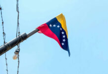 Trump’s Cartel Kill Claim—Where’s The Proof? Venezuelan flag flying on a pole.