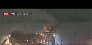 Crews tear down walls of Boyle Heights warehouse, providing a look inside