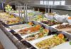 FBI Nabs Alleged $250M Meal Scam Boss A buffet table displaying a variety of colorful dishes and salads