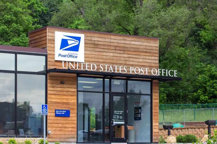 Exterior view of a modern United States Post Office building surrounded by greenery