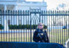 Agent Googling During Trump Gunfire Secret Service agent stands guard outside the White House.