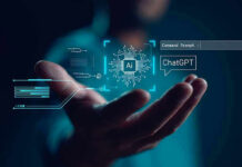 Phishing Goes Hyper-Real — Trust Cracks Hand holding digital AI and ChatGPT graphics.