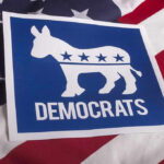 Democrats Scramble—Ballot Deadline Looms Democrats logo on American flag background