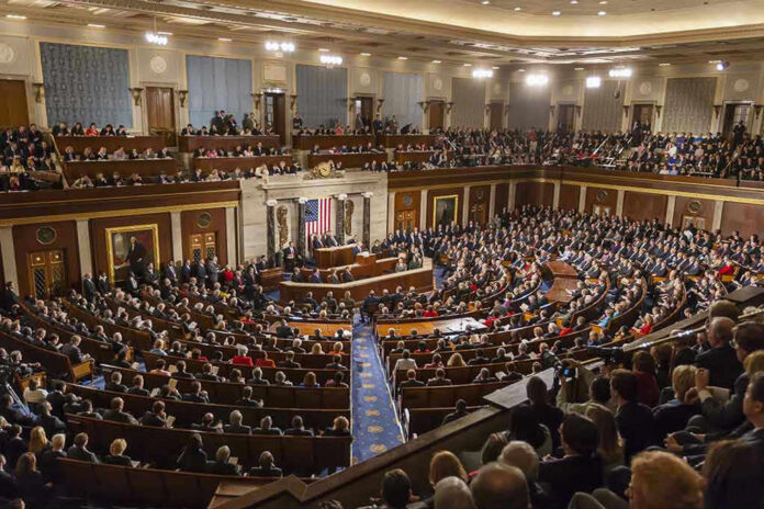 492045133 Large assembly in a government legislative chamber.