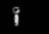 State Labels Mom ‘Abuser’ Over Pronouns face peering through a keyhole in darkness