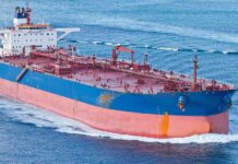 Hormuz Chaos: Tanker Hit, Trump Strikes Back Large cargo ship navigating through the ocean