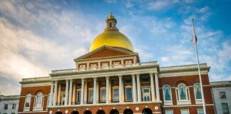 Massachusetts State House with golden dome and columns