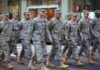 Military Recruiting ROARS Back Group of soldiers marching in a military parade on a city street