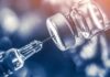 Tiny Habit, Big Hit: Nicotine Wrecks GLP-1 syringe needle drawing liquid from a vaccine vial