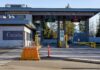 Canada border crossing booths with open and closed lane signs