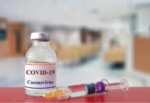 Redfield Slams Fauci — Apology Demanded vaccine vial and syringe on a counter in a clinic