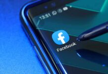 Breaking News: Meta’s Massive Settlement Facebook app icon on smartphone screen with stylus