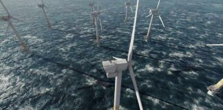 Offshore wind turbines in rough sea from aerial view