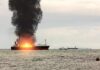 Trade Lifeline Attacked — Crew Barely Saved Cargo ship on fire with thick black smoke at sea