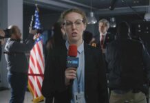 Top Reporter Accused — Harassment Bomb Drops Reporter with red microphone at press event