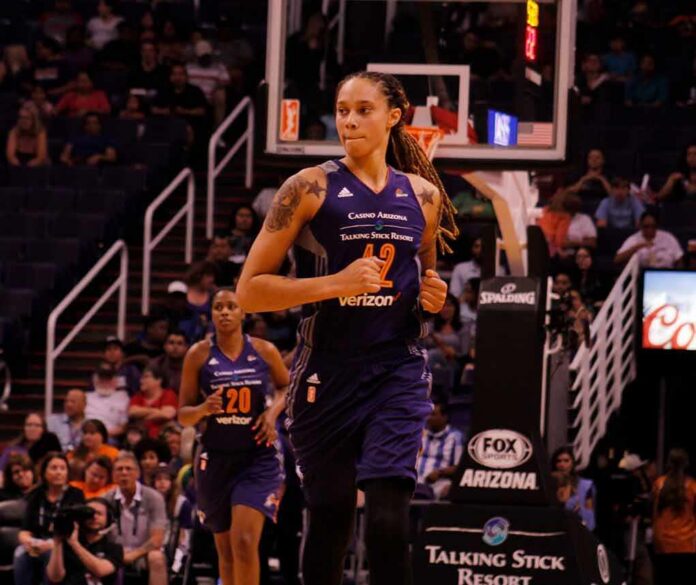Basketball player running on court during game
