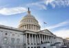 United States Capitol building under a blue sky