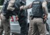 Camera Trail Exposes Deadly Double-Cross Police officers arresting a person beside a car