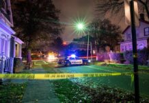 Home Invasion Horror – ‘Elijah’ Named Mid-Attack Police car blocks residential street at night behind caution tape