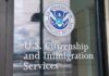 Door with U.S. government seal and office lettering