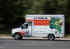 Brooklyn Trucks, Hundreds Of Dead Birds – Why? U-Haul moving truck driving on a road