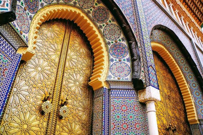 ornate golden doors with colorful mosaic arches