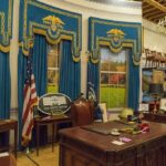 Prayer Drama Erupts Inside Oval Office Oval Office-style desk and decor in a museum display